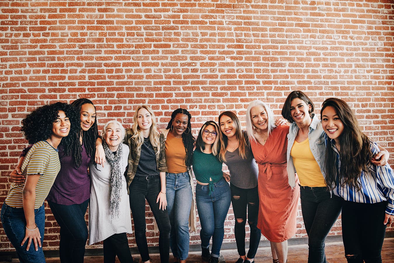 A diverse group of women standing together