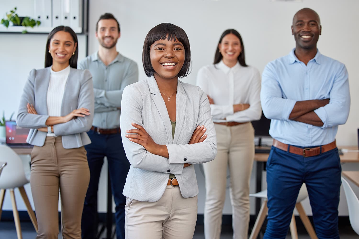 A diverse group standing together, prepared to grow and lead