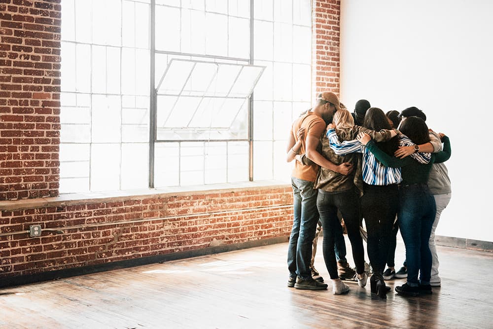 People encouraging one another in community
